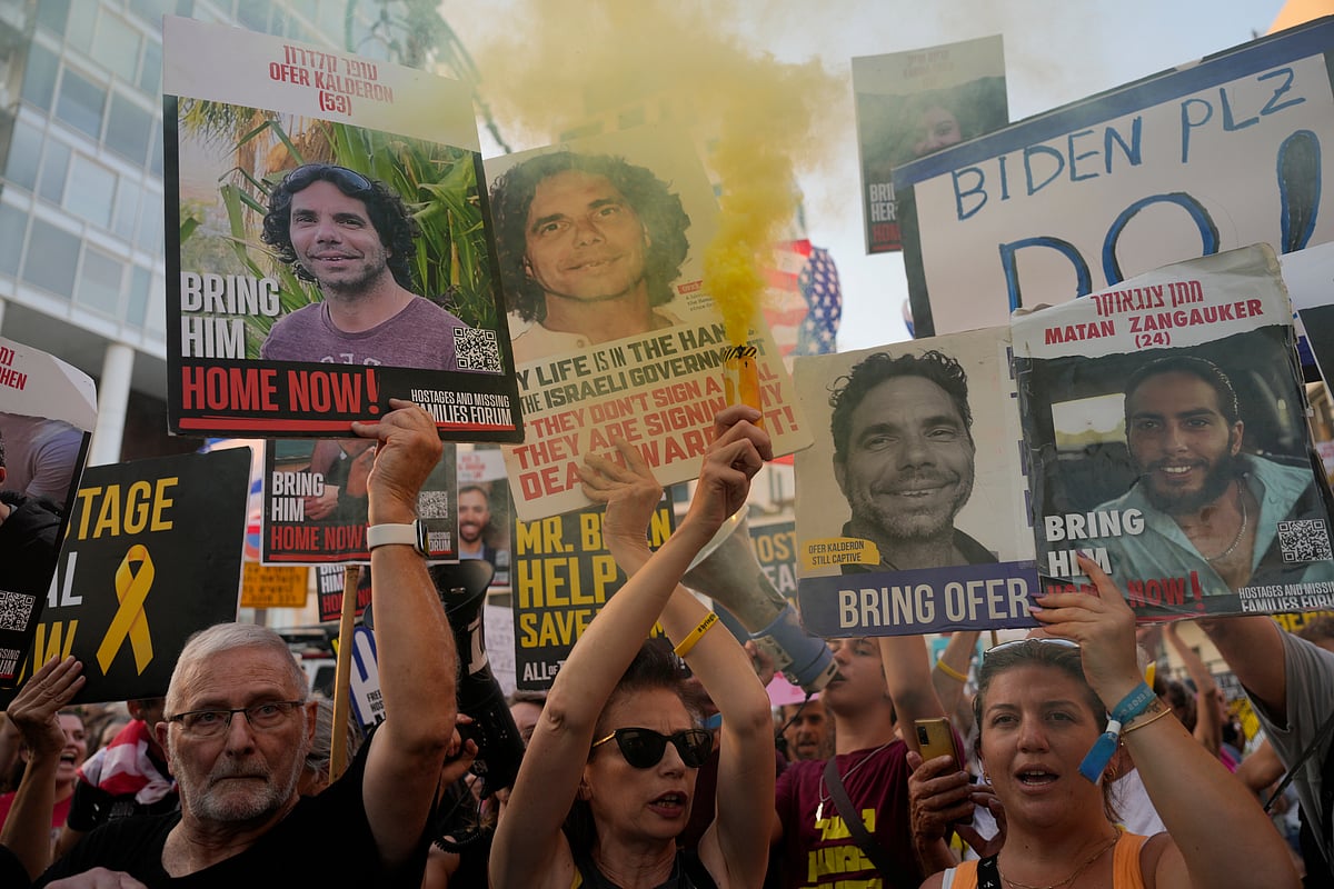 AP : Relatives of hostages held by Hamas in the Gaza Strip and their supporters protest near the hotel where U.S. Secretary of State Antony Blinken is staying during his visit in Tel Aviv, Monday, Aug. 19, 2024